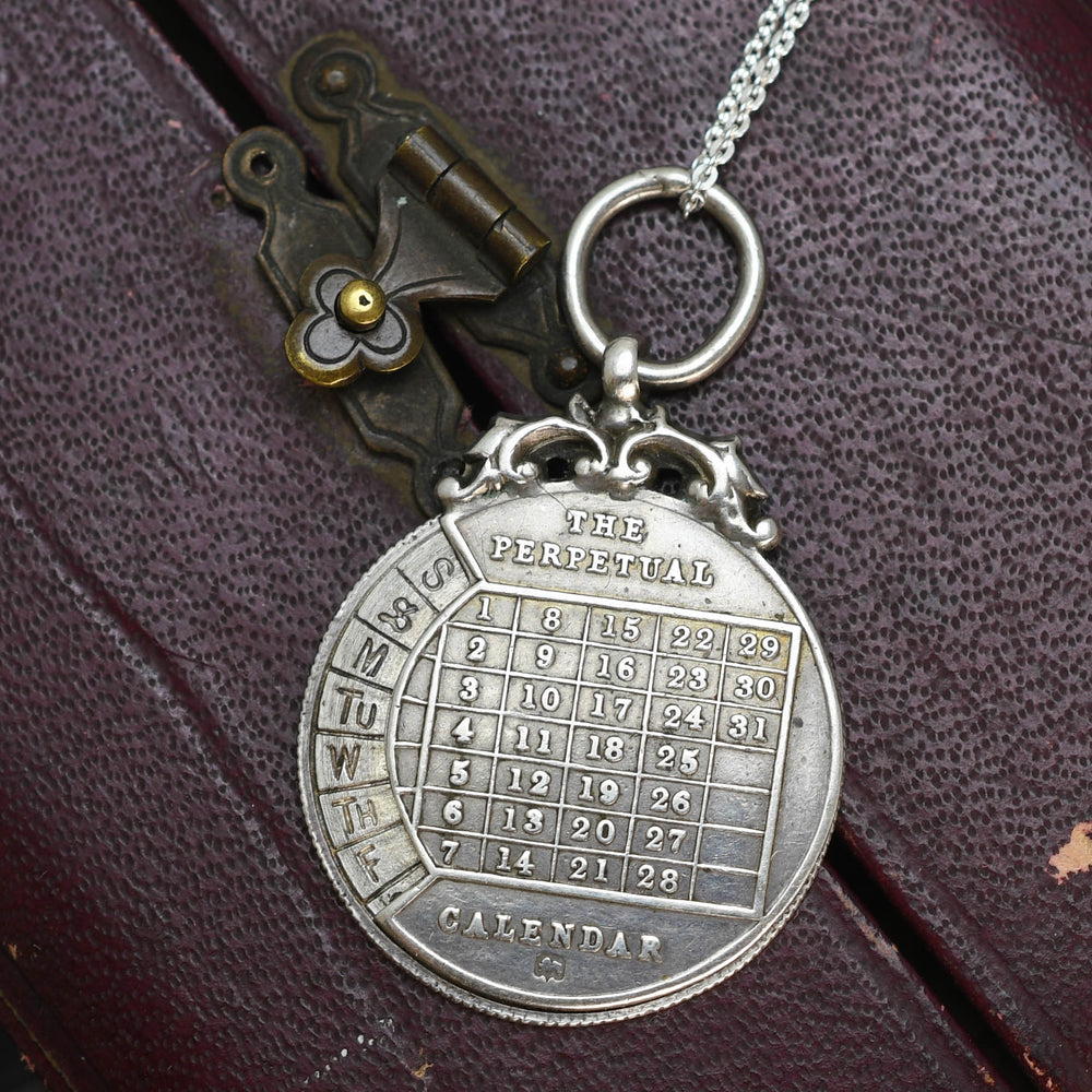 Edwardian Silver Perpetual Calendar Pendant