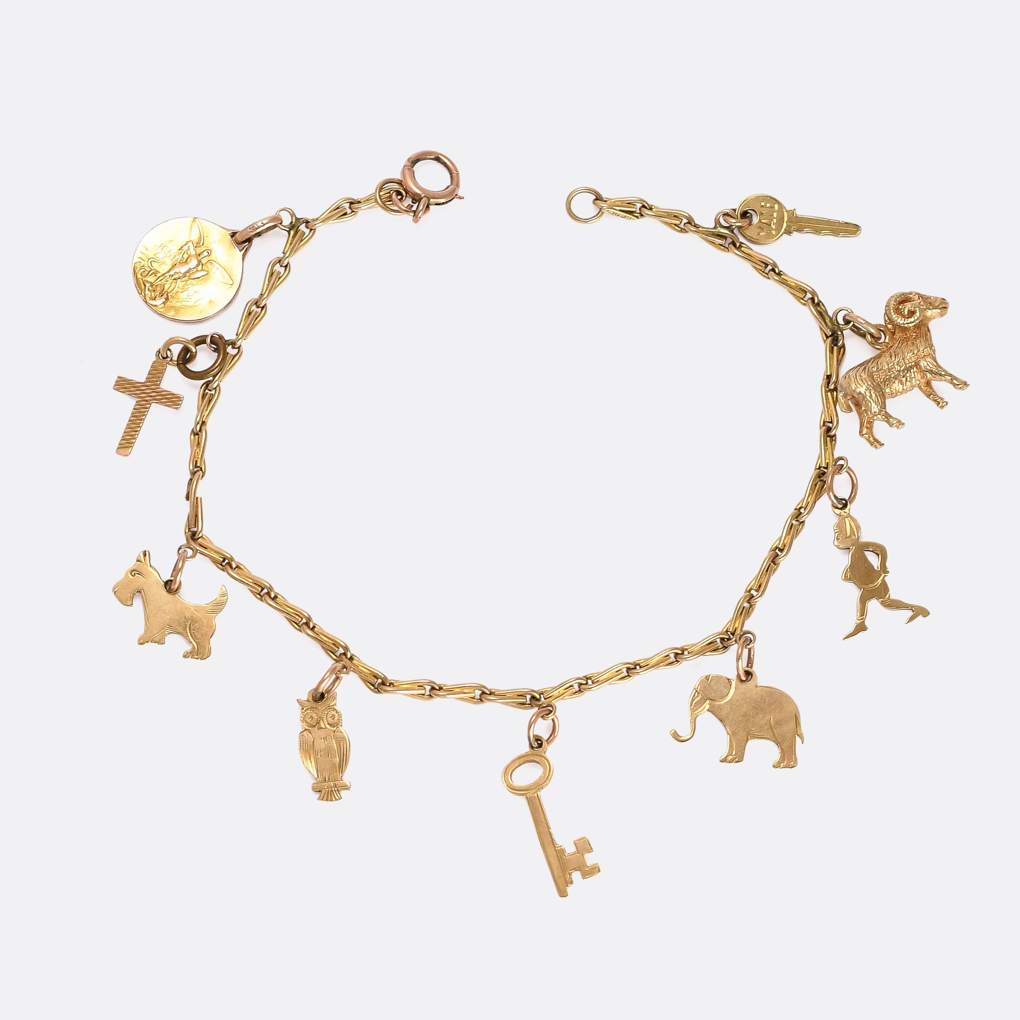Mid-Century Gold Charm Bracelet – Butter Lane Antiques